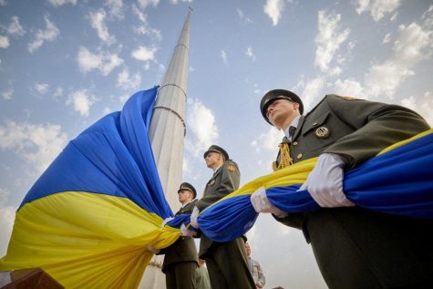 Members of the Honour Guard attend a rising ceremony of the Ukraines biggest national flag to mark the Day of the State Flag, amid Russias attack on Ukraine, in Kyiv, Ukraine August 23, 2022.  Ukrainian Presidential Press Service/Handout via REUTERS ATTENTION EDITORS - THIS IMAGE HAS BEEN SUPPLIED BY A THIRD PARTY.     TPX IMAGES OF THE DAY